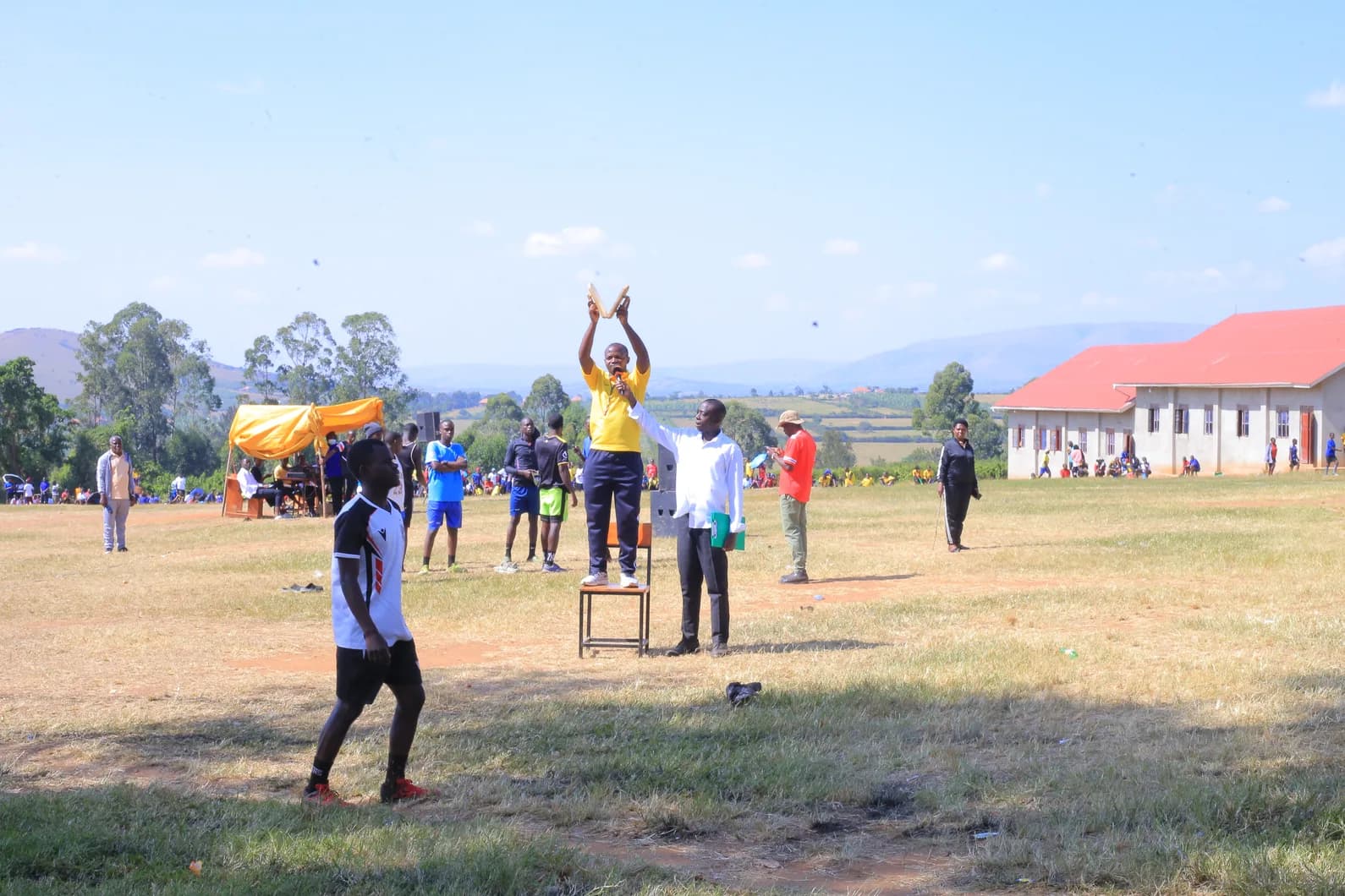 Students playing volleyball during sports day.